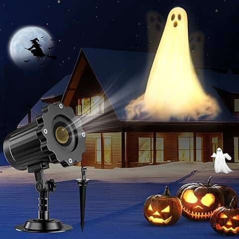 Animated ghost projectors displaying moving ghosts on a house wall as part of spooky ghostly Halloween decorations.